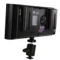Falcon Eyes T6 bi‑color LED lamp panel shown from the rear, mounted on a mini ball head, featuring a release button, LCD display, rotary control knob and battery slots, compact 20W LED light for studio and on‑location video.