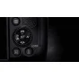 Canon EOS 850D DSLR camera top rear control panel featuring white Q button, AF/WB dial, and playback buttons