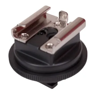 Caruba Hotshoe Adapter for Sony Active Interface Shoe - Compact black and silver adapter with textured base and metallic brackets for mounting video lights and microphones.
