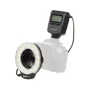 Meike FC-110 ring flash attached to a Canon EOS camera lens, LED ring illuminated, flash unit on hot shoe with LCD display, ideal for shadow‑free close‑up and macro photography