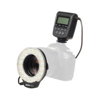 Meike FC-110 ring flash attached to a Canon EOS camera lens, LED ring illuminated, flash unit on hot shoe with LCD display, ideal for shadow‑free close‑up and macro photography