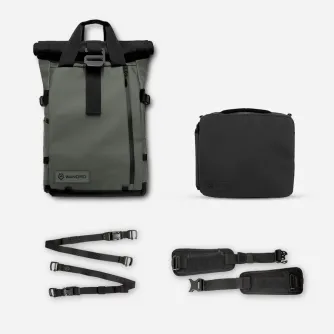 WANDRD PRVKE 21-Liter green roll-top backpack with black trim, magnetic handles, and a camera cube, featuring a laptop sleeve, side compartment, and elastic band for lens caps.