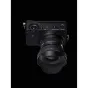 Sigma 10-18mm F2.8 DC DN Contemporary lens for Sony E-mount, ultra-wide-angle zoom with fast aperture, attached to a mirrorless camera body, top control panel view