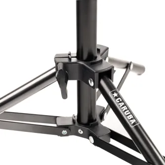 Close-up of the Caruba LS-50 50 cm lighting tripod leg joint, showing the black adjustable clamp and the CARUBA logo on the leg.
