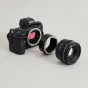 URTH Lens Mount Adapter for Canon EF/EF-S to Nikon Z - Secure manual connection for hybrid lens pairing with visible red sensor and silver ring.
