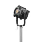 Godox MG1200Bi Bi-color Knowled Light Kit 2 mounted on a silver stand with a black yoke, featuring a yellow central lens and a sleek black body with 'MG1200Bi' in white text, designed for professional photography and video light