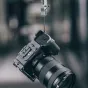 Falcam F22 & F38 & F50 Quick Release Camera L-Bracket (C00B3503) for Sony ZV-E1, featuring multiple mounting points, including 1/4 screw holes, Arri positioning holes, and a cold shoe, with accessible camera buttons and battery 