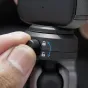 PGYTECH CapLock trīsrakņu vakuuma stiprinājums ar regulējamu drošības atslēgu, tuvplānā redzams melnais korpuss, dubultā bumbiņa un pirkstu skrūve.