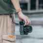 Falcam F22 Quick Release Bottom Plate for Sony A7C, featuring a wrist strap and tripod mount.