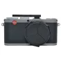 Kiwi CR-X1 Custom Mechanical Cable Release Adapter attached to Leica X1 Camera with a sleek design and red Leica logo.