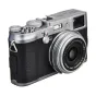 JJC Soft Release Button SRB-B10GR attached to a camera shutter, featuring a brass construction with rubber rings for enhanced grip.