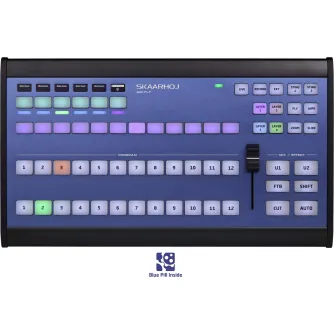 Skaarhoj Air Fly Controller for vMix Systems - Close-up of the blue front panel featuring buttons, LED indicators, and a transition fader, with illuminated buttons in green, red, and purple, and brand name 'SKAARHOJ AIR-FLY' vis