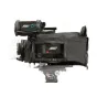 Black rain cover for ARRI ALEXA Mini LF camera featuring a clear plastic window, red button, and hook-and-loop fastener, mounted on a tripod with visible adjustment knobs.