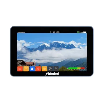 Shimbol M5 5.5-inch on camera monitor, kas attēlo kalnu ainavu ar sniegotiem virsotnēm un mākoņiem, ar tehniskām ikonām un krāsu kalibrēšanas joslu apakšā.