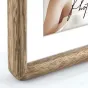 Фоторамка Zep Photo Frame BC23P Gressan 15x20 20x30 см с деревянной отделкой и белой матовой рамкой, отображающая часть плеча и туловища человека, подходит для использования в доме или офисе.