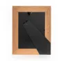 Задняя сторона фотофрейма Zep Photo Frame XN768G Vienna Gold 15x20 см, с деревянной рамой светлого оттенка и черной задней панелью с крепежом.