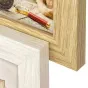 Zep Italia Locarno White рамка DT553W, размер 5x10x15 см, находится рядом с натуральной деревянной рамкой, в которой лежит карта, старинный компас и красная ручка с увеличительным стеклом, подчеркивая белый деревянный каркас и с