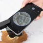 Микроскоп Carson MM-300 MicroBrite Plus 60-120x с адаптером для смартфона - увеличение текстурированной поверхности через адаптер для смартфона