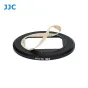JJC RN-CLUX Filter Adapter & Lens Cap Kit for Leica C-Lux Compact Camera with 49mm filters, featuring a black circular adapter with a rectangular cutout and engraved text, along with a beige adhesive tape strip and a lens cap ho