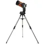 Телескоп Celestron NexStar 6SE на серебряном штативе с черной вилкой, с оранжевой трубой, черной передней крышкой и панелью управления с кнопками и цифровым дисплеем.
