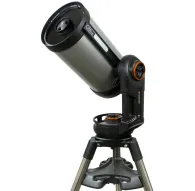 Телескоп Celestron NexStar Evolution 9.25, установленный на штативе, направленный вверх с снятой крышкой объектива, с элегантным серебристым корпусом и черными акцентами, а также оранжевым кольцом у крепления.Телескоп Celestron NexStar Evolution 9.25, установленный на штативе, направленный вверх с снятой крышкой объектива, с элегантным серебристым корпусом и черными акцентами, а также оранжевым кольцом у крепления.