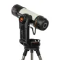 Телескоп Celestron Origin Intelligent Home Observatory на штативе, с белым цилиндрическим корпусом, черными и оранжевыми акцентами, включая заметный оранжевый логотип, витковый кабель и черное крепление с красной кнопкой.