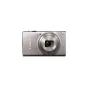 Серебряная компактная камера Canon IXUS 285 HS с 12-кратным оптическим зумом и встроенным Wi-Fi, оснащённая 20,2 МП сенсором и процессором DIGIC 4+, представлена спереди на белом фоне.