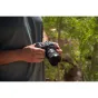 Canon RF-mount Sigma 15mm f/1.4 DC Contemporary ultra-wide lens for APS-C mirrorless cameras in use outdoors, showcasing compact and portable design for landscape and astrophotography