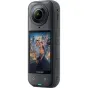 Insta360 X5 8K 360-degree action camera side view with cityscape preview on screen, showcasing dual-lens design and compact build
