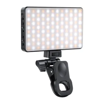 Neewer BL120B clip-on LED selfie light with diffuser, attached to a mounting clamp, illuminated with adjustable brightness for professional video calls and streaming