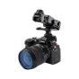 Адаптер JJC HSC OP3 для горячего башмака DSLR камеры со складывающимся дизайном, установленный на штативе, с дополнительной точкой крепления для аксессуаров.