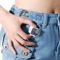 Ulanzi DG01 Cube Mini Light Black attached to denim jacket cold shoe mount, compact 22g portable LED light with 3 brightness levels and 500mAh battery