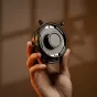 Viltrox NexusFocus F1 S single motor adapter with illuminated display and tactile buttons for precise manual lens autofocus control