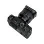 Объектив Fujifilm XF 56mm f/1.2 R WR с насадкой JJC LH JXF56F12R матовым покрытием, вид сверху и сзади, видны органы управления камеры и детали объектива