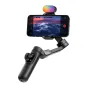 Стабилизатор AOCHUAN X Pro с RGB-подсветкой в работе, смартфон закреплен для съемки стабилизированного видео с включенным верхним светом