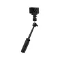 JJC QRAM CS magnetic quick release adapter for DJI Action 5 Pro/4/3 mounted on an extendable selfie stick with cold shoe mount
