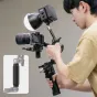 Ulanzi TA10 3-section articulating arm with 360° ball head mounted on DSLR camera, showcasing flexible positioning for lights and accessories, including NATO rail adapter and silicone grip cover