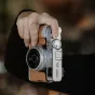 Fujifilm X100VI in stylish PGYTECH Clay Brown leather case with precise button cutouts and secure aluminum base for protection