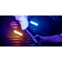 Newell Mr Mist wireless smoke generator in action, featuring vibrant RGB lighting and a dense blue-tinted smoke effect for professional photography and videography.