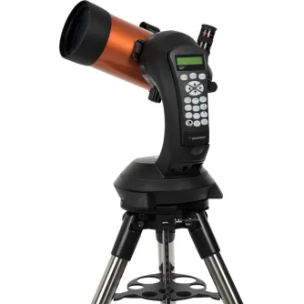 Celestron NexStar SE 4 telescope with digital hand control and sturdy tripod, ready for stargazing and celestial object tracking
