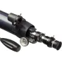 Celestron AstroMaster accessory kit close-up: 1.25-inch eyepiece, 2X Barlow lens with T-threads, and microfiber cleaning cloth for telescope optics maintenance