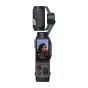 Insta360 Luna Ultra action camera in Cosmic Black with detachable 2-inch touchscreen displaying live 3K video preview and attached professional microphone for high-quality audio recording