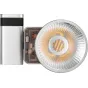 ZHIYUN Molus X60 RGB Pro COB light with illuminated RGB LED panel and advanced cooling fins, featuring a battery handle attachment and PD charging port