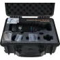 Laowa Proteus 2X Anamorphic 85mm T2 lens in a protective case with EF mount adapter, lens support foot, tools, and user manual