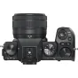 Fujifilm X-S20 mirrorless camera with XC 15-45mm Vlogger zoom lens, top view showing mode dial, ISO button, and lens zoom ring