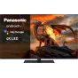 Panasonic 65 colu 4K LED Android TV ar Google Asistentu, demonstrējošs izcilus HDR attēlus ar fantāzijas pūķi, ideāls mājas kino pieredzei