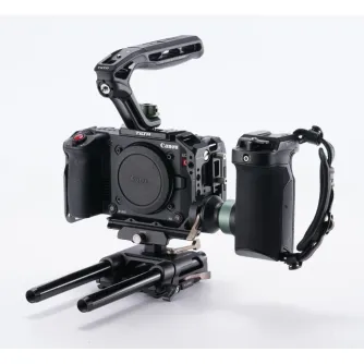 Tilta Camera Cage for Canon C50 Power Kit with V-Mount battery plate, adjustable handle, and Arca-Swiss tripod base for professional videography