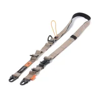 Tilta Fe multi-functional shoulder strap featuring durable beige polyester webbing with black and orange accents, adjustable carabiners, and a dual drawstring lock system for secure attachment of camera gear and accessories.Tilta Fe multi-functional shoulder strap featuring durable beige polyester webbing with black and orange accents, adjustable carabiners, and a dual drawstring lock system for secure attachment of camera gear and accessories.