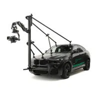 Tilta Hydra Shock Absorbing Arm Pro Kit uzstādīts uz SUV jumta profesionālai kinomākslas stabilizācijai ar regulējamu hidraulisko dempingu un 30 kg kravnesībuTilta Hydra Shock Absorbing Arm Pro Kit uzstādīts uz SUV jumta profesionālai kinomākslas stabilizācijai ar regulējamu hidraulisko dempingu un 30 kg kravnesību