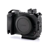 Tilta Full Camera Cage for Canon R50 V - black side view featuring cold shoe mount and ARCA-Swiss compatible plateTilta Full Camera Cage for Canon R50 V - black side view featuring cold shoe mount and ARCA-Swiss compatible plate